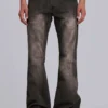 Brązowe jeansy typu bootcut z przetarciami
