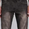 Brązowe jeansy typu bootcut z przetarciami