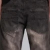 Brązowe jeansy typu bootcut z przetarciami