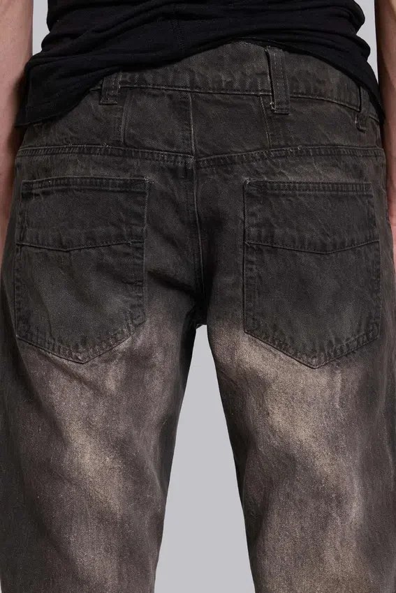 Brązowe jeansy typu bootcut z przetarciami