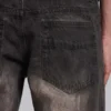 Brązowe jeansy typu bootcut z przetarciami