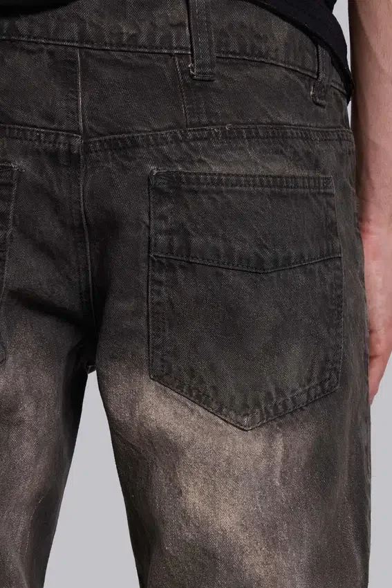 Brązowe jeansy typu bootcut z przetarciami