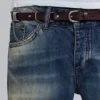 Brązowy skórzany pasek typu „saddle skinny”