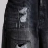 Colossus Jeans XL z efektem postarzenia i łańcuchowymi detalami