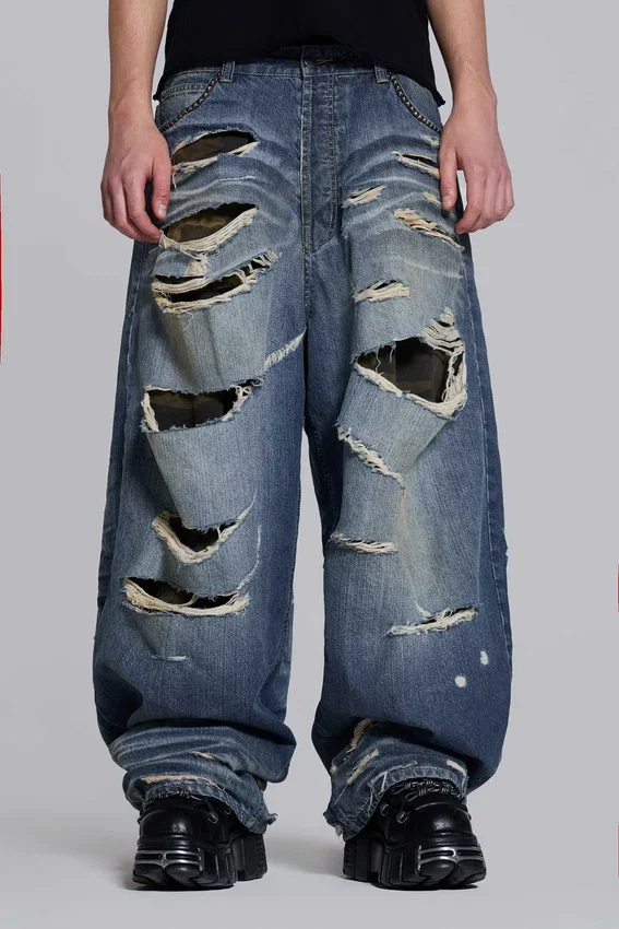 Colossus Jeans XL z podartymi nogawkami i ukrytym wzorem kamuflażu