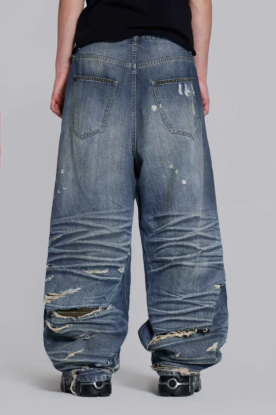 Colossus Jeans XL z podartymi nogawkami i ukrytym wzorem kamuflażu