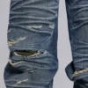Colossus Jeans XL z podartymi nogawkami i ukrytym wzorem kamuflażu
