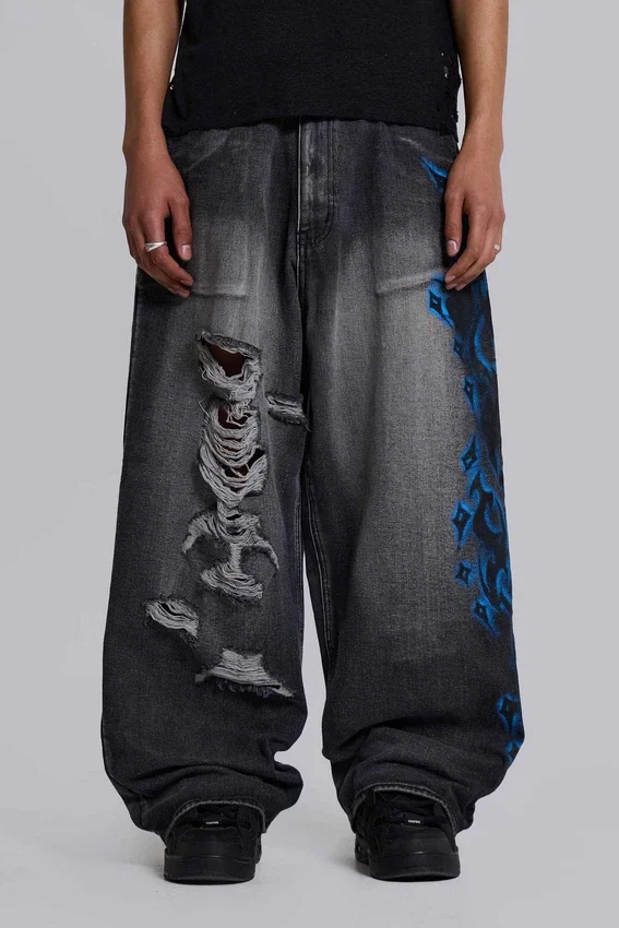 Czarne Colossus Jeans XL z przetarciami i nadrukiem Spike Airbrush