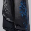 Czarne Colossus Jeans XL z przetarciami i nadrukiem Spike Airbrush