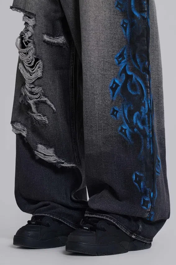 Czarne Colossus Jeans XL z przetarciami i nadrukiem Spike Airbrush