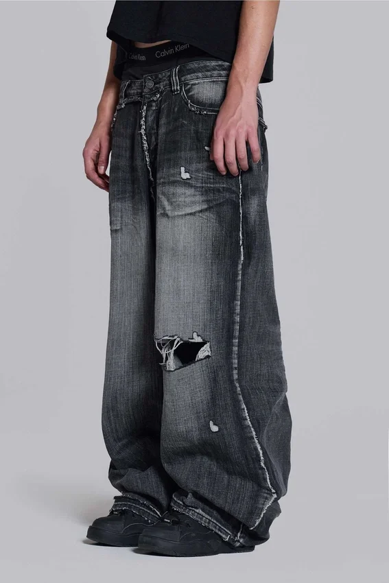 Czarne jeansy XL Colossus z efektem erozji