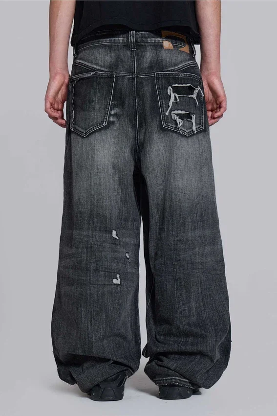 Czarne jeansy XL Colossus z efektem erozji