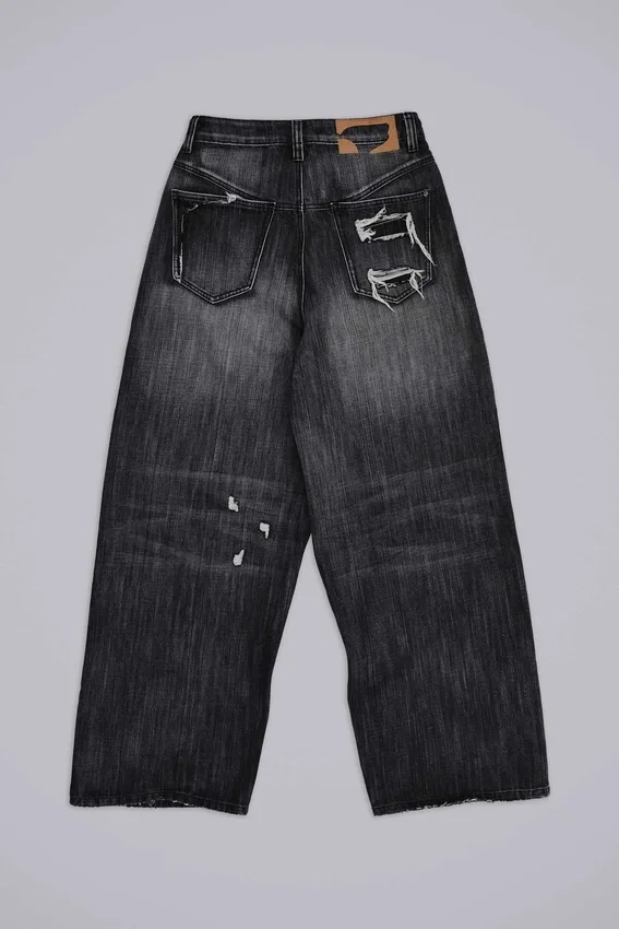 Czarne jeansy XL Colossus z efektem erozji
