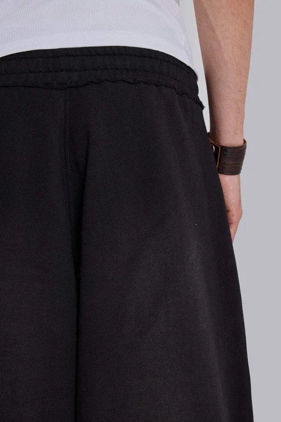 Czarne, luźne spodenki Monster Joggers z mankietami