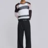 Czarne spodnie garniturowe typu bootcut z podwójnym szwem