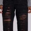 Jeansy Zain z postrzępionymi nogawkami typu bootcut w kolorze czarnym