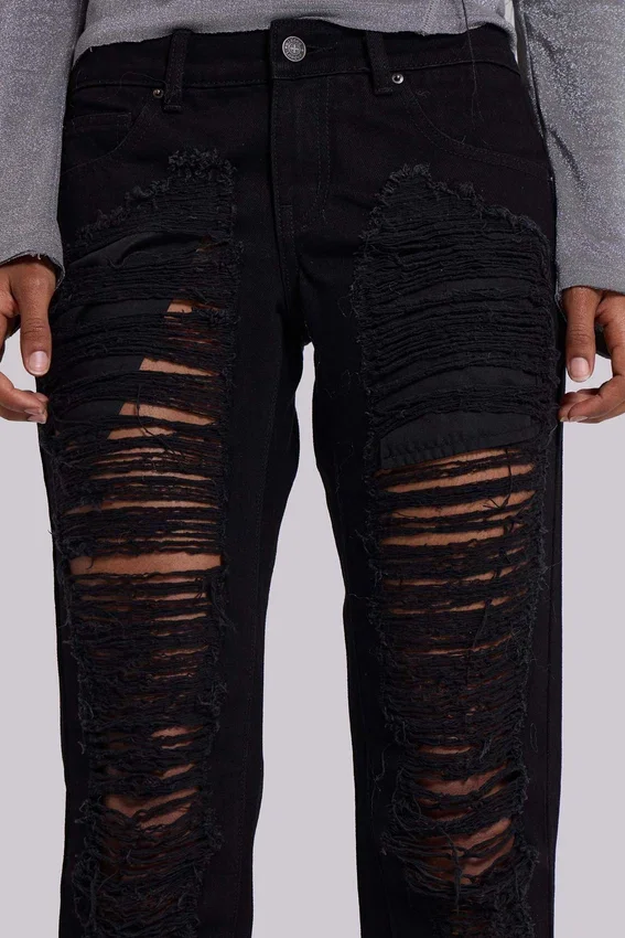 Jeansy Zain z postrzępionymi nogawkami typu bootcut w kolorze czarnym