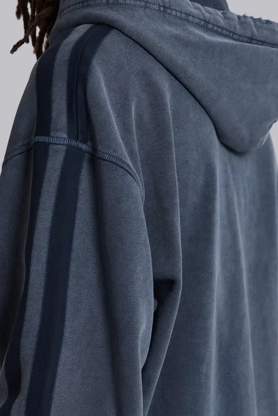 Niebieska sportowa bluza z kapturem „Monster Hoodie” o luźnym kroju