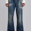 Niebieskie jeansy „Jude Bootcut” z rozszerzanymi nogawkami w odcieniu „Mid Wash”