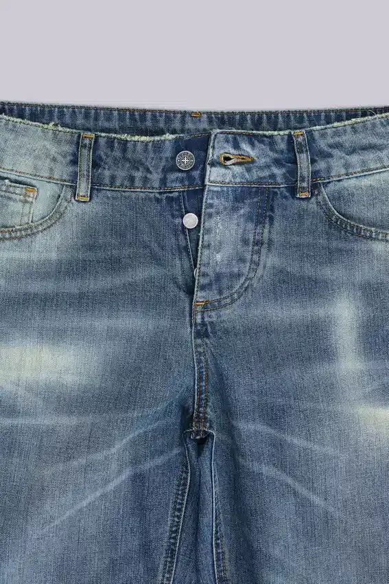 Niebieskie jeansy „Jude Bootcut” z rozszerzanymi nogawkami w odcieniu „Mid Wash”