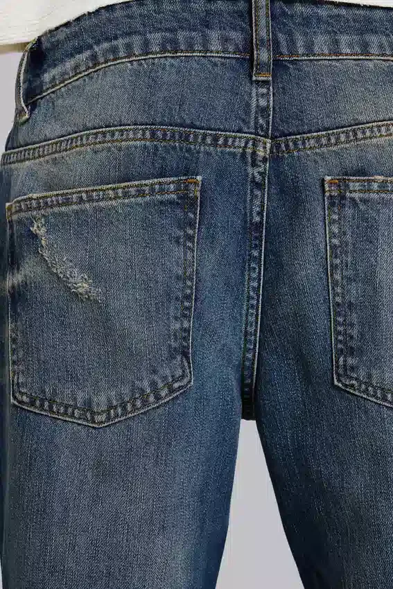 Niebieskie jeansy „Jude Bootcut” z rozszerzanymi nogawkami w odcieniu „Mid Wash”