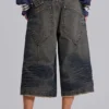 Niebieskie szorty Colossus Jorts z regulacją z tyłu