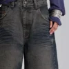 Niebieskie szorty Colossus Jorts z regulacją z tyłu