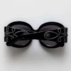 Okrągłe okulary przeciwsłoneczne Majorette Oversized w kolorze czarnym