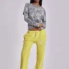 Spodnie dresowe Cleo o luźnym kroju typu bootcut w kolorze neonowym