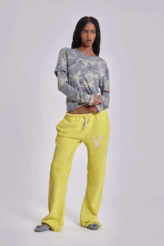 Spodnie dresowe Cleo o luźnym kroju typu bootcut w kolorze neonowym