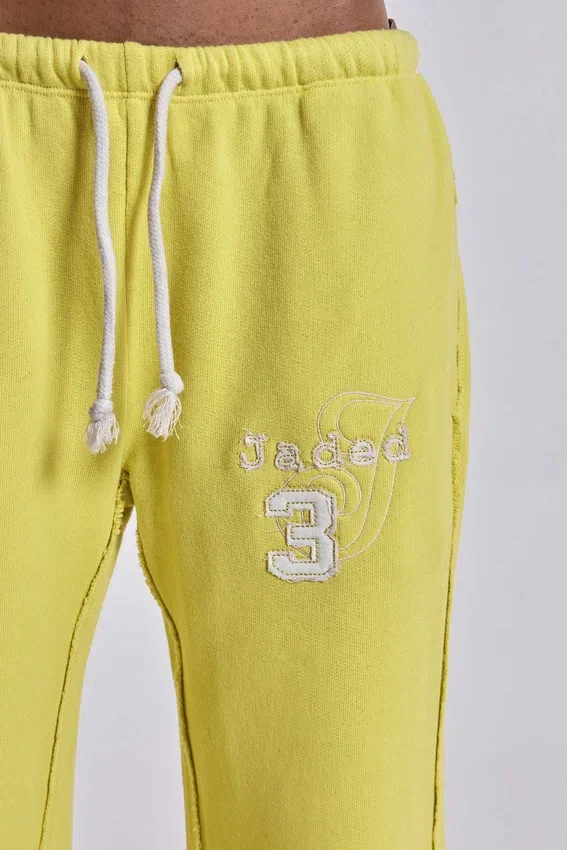 Spodnie dresowe Cleo o luźnym kroju typu bootcut w kolorze neonowym