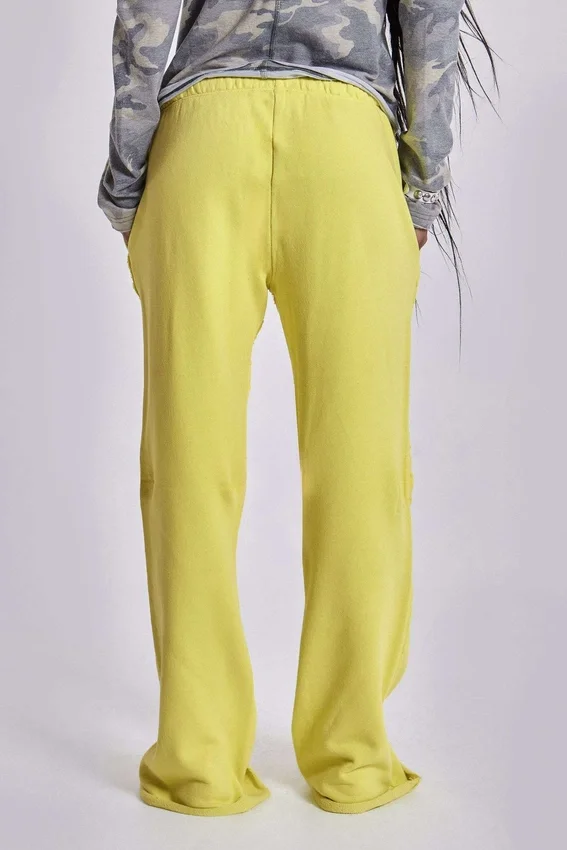 Spodnie dresowe Cleo o luźnym kroju typu bootcut w kolorze neonowym