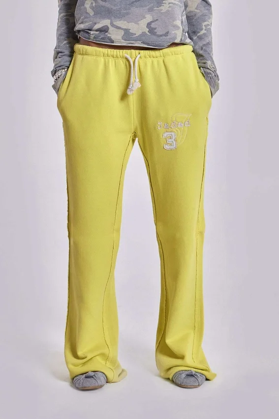 Spodnie dresowe Cleo o luźnym kroju typu bootcut w kolorze neonowym
