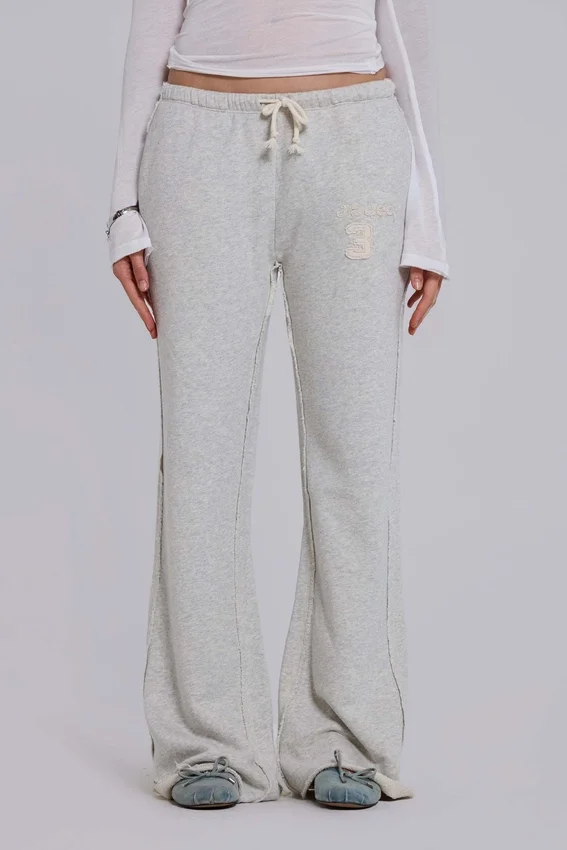 Spodnie dresowe Cleo o luźnym kroju typu bootcut w kolorze szarym melanżowym