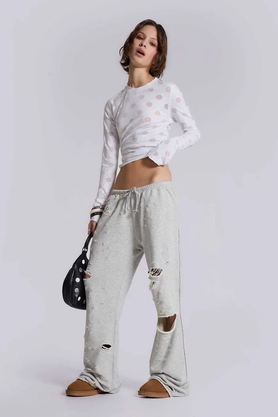 Spodnie dresowe Cleo z efektem postarzenia i luźnym krojem typu bootcut