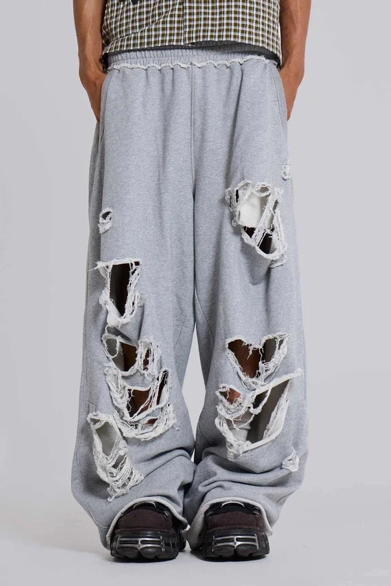 Spodnie dresowe Monster Joggers w stylu baggy z efektem postarzenia w kolorze szarym melanżowym