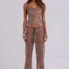 Spodnie z dzianiny z cekinami Deva w kolorze piaskowym