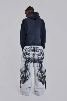 Szare, melanżowe spodnie dresowe typu Monster Joggers z gotyckim nadrukiem „Monster”