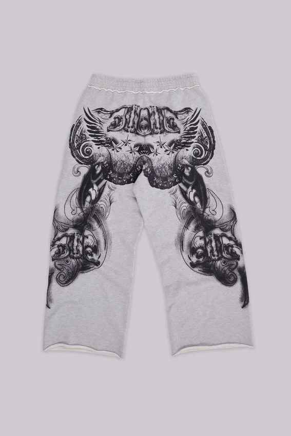 Szare, melanżowe spodnie dresowe typu Monster Joggers z gotyckim nadrukiem „Monster”