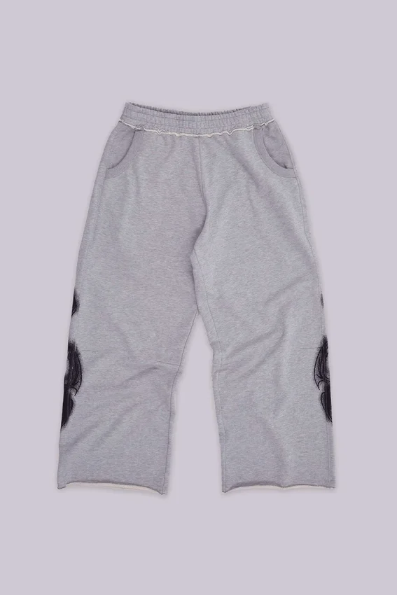 Szare, melanżowe spodnie dresowe typu Monster Joggers z gotyckim nadrukiem „Monster”