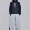 Szare, melanżowe spodnie dresowe typu Monster Joggers z gotyckim nadrukiem „Monster”