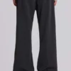 Szare spodnie garniturowe typu bootcut z fałdami